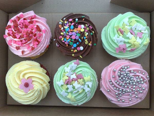 Photo for the offer - 6 free cupcakes with every order of Large Cake